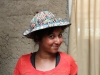 A traditional Inca hat worn by a non-traditional Inca